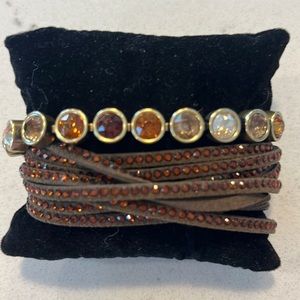 Touchstone Crystal smoked amber wrap and fallen leaves ice bracelets.